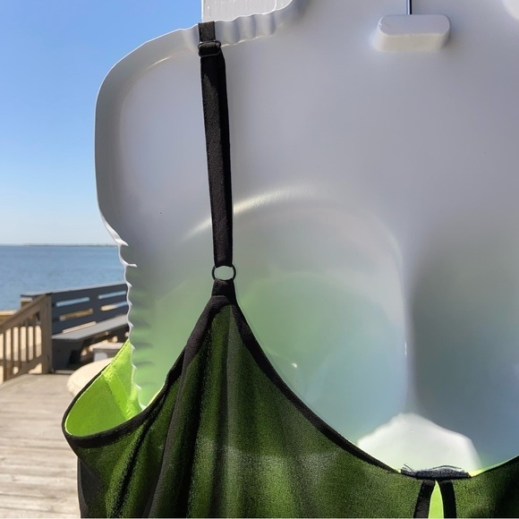 Black and chartreuse glossy top with adjustable straps, and a flowing open back. - Picture 5 of 5